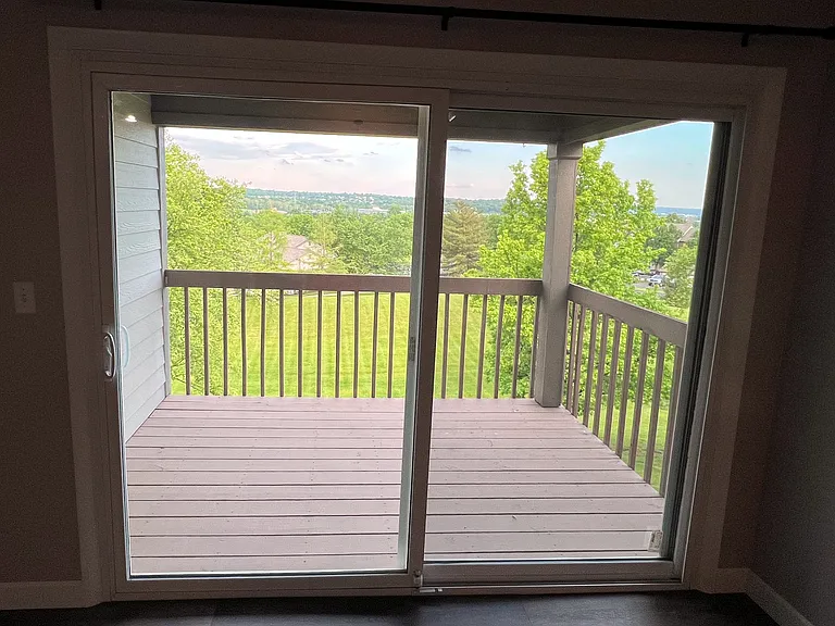 Covered Balcony with Sunset & City Light Views