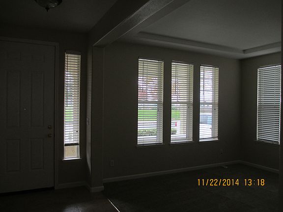 living room has lots of windows