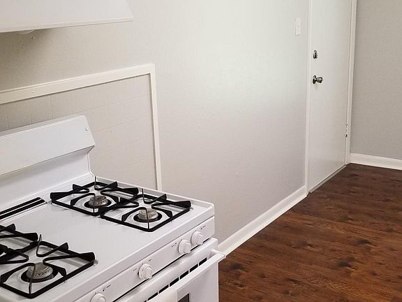 Gas range and a vent hood that vents out of the house.