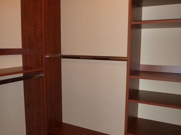 Closet organizers in master bedroom