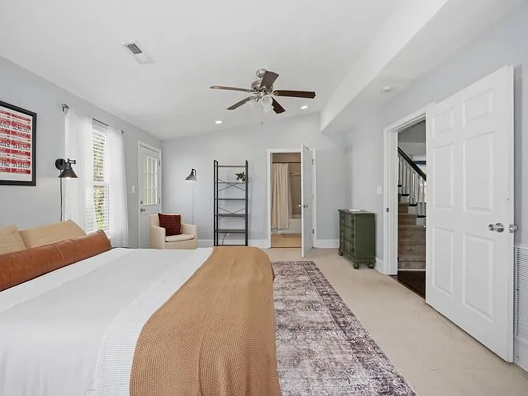 Room 1: Primary bedroom with Queen size bed. Very spacious with walk-in closet and en suite bathroom.
