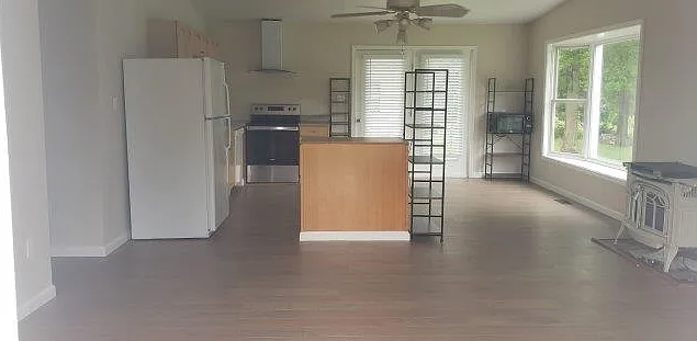 Enter into open common area (living/dining/kitchen)