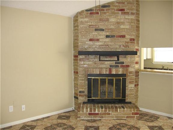Brick corner fireplace.