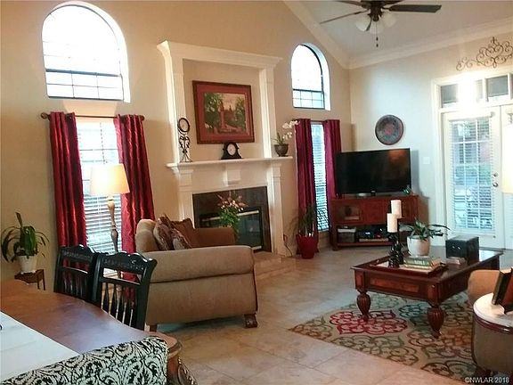 Living Room with Double French Doors leading to the screened-in back patio!