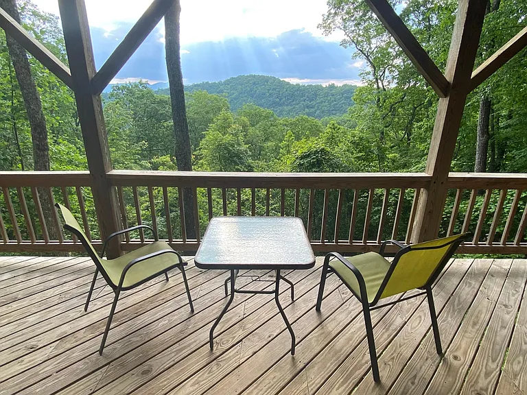 Walk out from the lower level to Relax in the downstairs deck with this view!