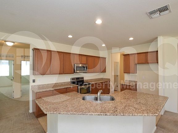 5th image of 12115 W Daley Ln