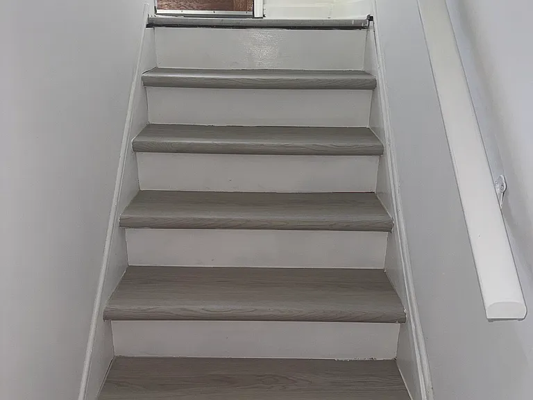 steps going to the den and front door
