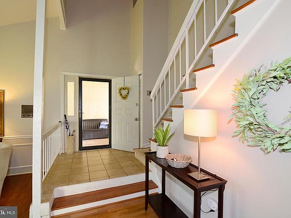Enter into spacious 2-story foyer