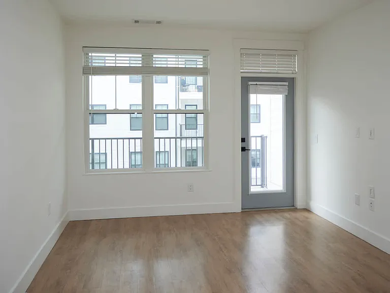 Living Room with Balcony and Hard Surface Flooring