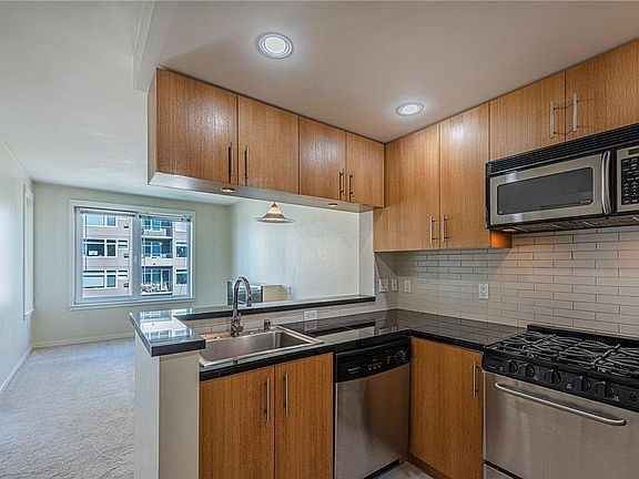 Beautiful updated kitchen with stainless steel appliances and gas range and plenty of cabin space