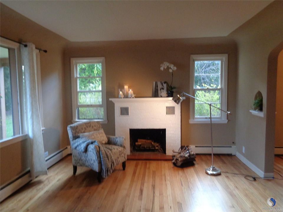 Cozy wood f/plc huge picture window