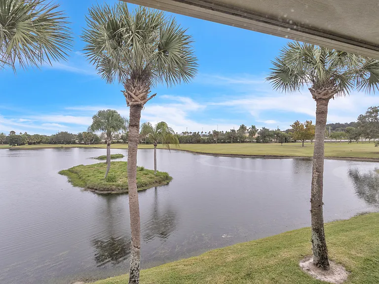 Stunning lake & golf course views from Primary Bedroom