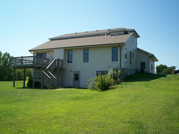 view of rear, shows deck 