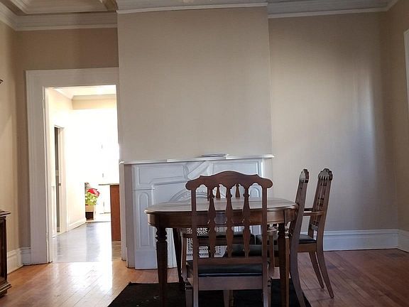 from living room looking at the dining room and kitchen beyo