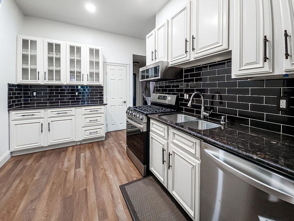 Fully renovated kitchen with new stainless steel appliances