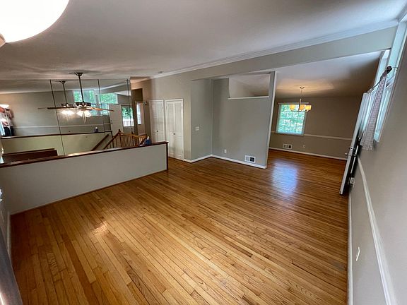 main level, with formal living, dining, kitchen, two bedrooms and a full bath with deck off of dining room