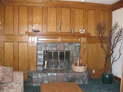 Stone Fireplace with Red Oak Paneling