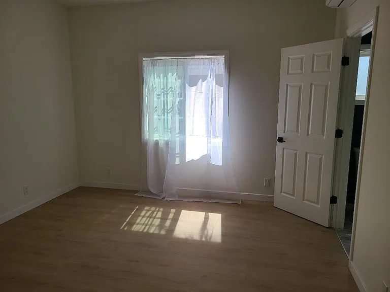 Bedroom 2 - Blackout shades being installed