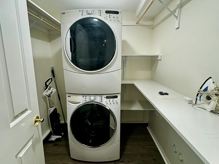 washer dryer located inside walk in closet