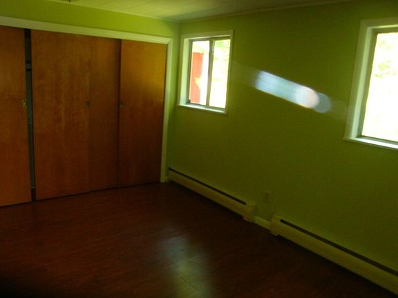 larger bedroom with huge closet