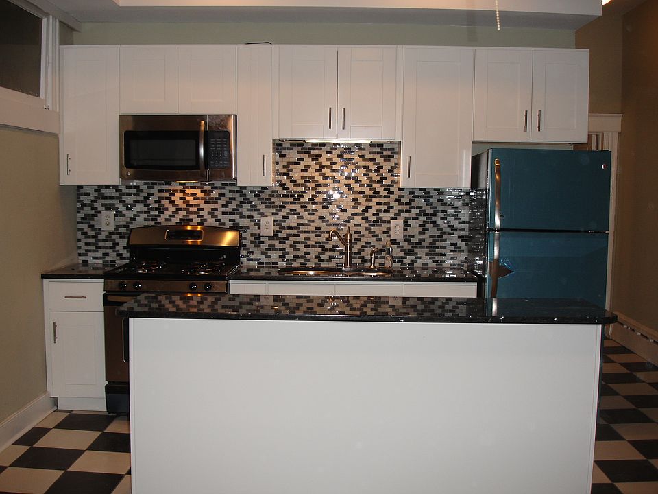 Custom Kitchen with New Stainless Steel Appliances