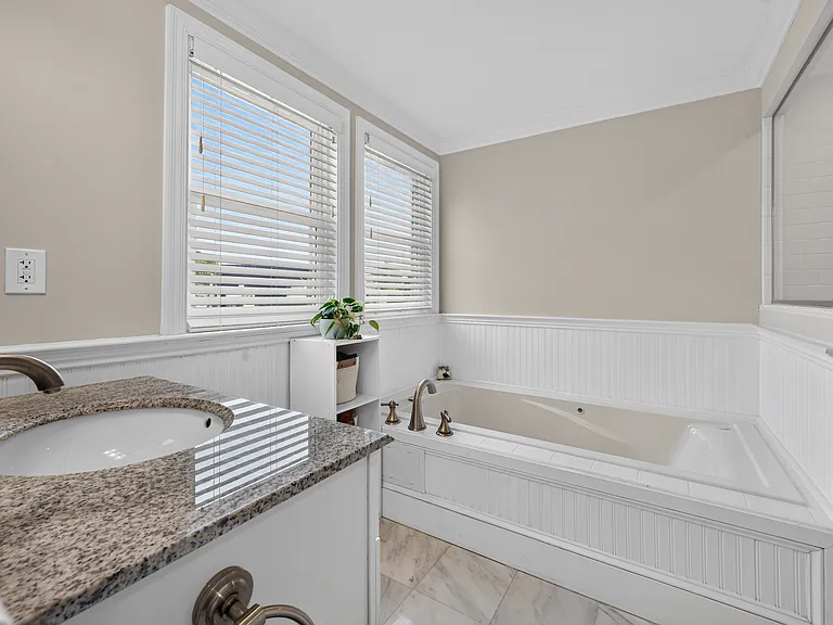 Master bathroom (full shower not pictured, to the right)