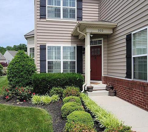 Mature landscaping and lawn maintenance are provided by the HOA.