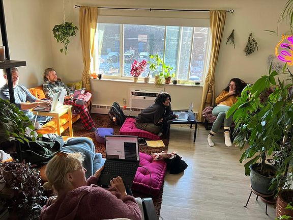 A shot of us having some friends over for a coworking day in the living room