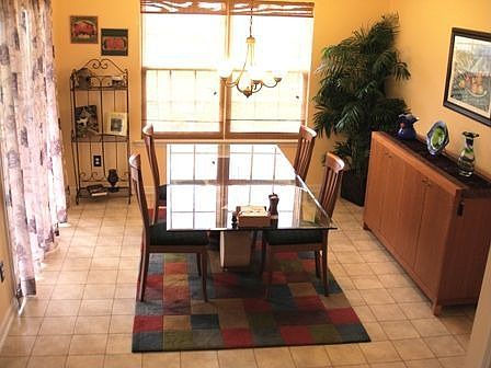 Dining room w/ views to the backyard.