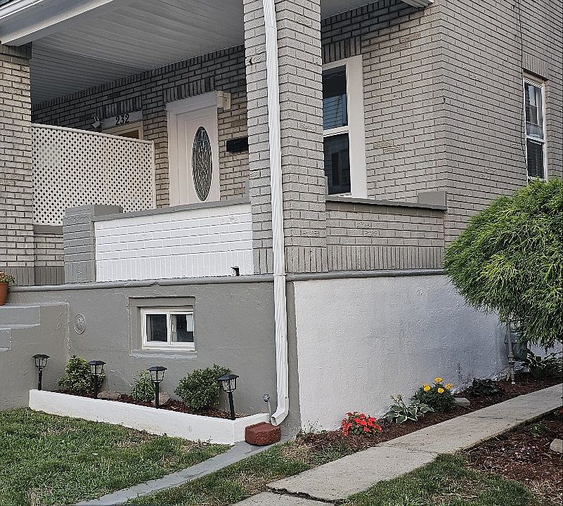 FRONT N SIDE OF HOUSE