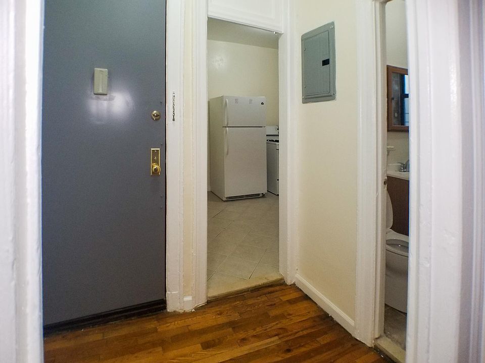 Foyer with kitchen and bathroom to the right