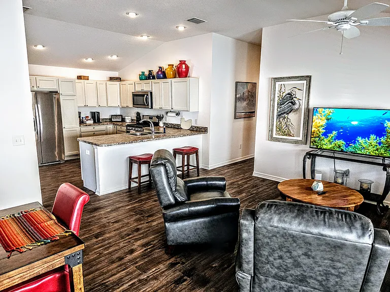 Dining room table will seat six and looks into the living room that leads to the side patio.