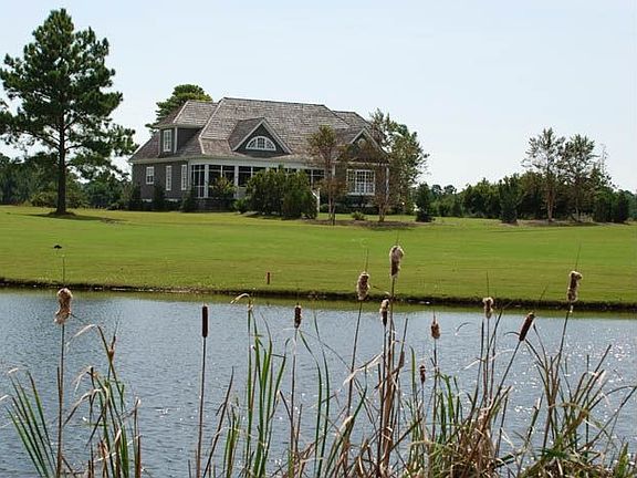 view across pond - back of home