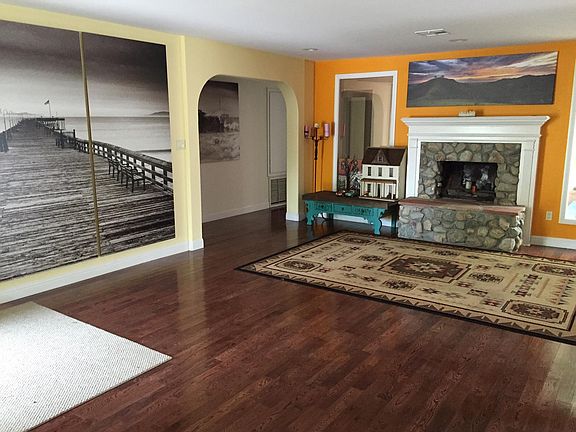 Stone Fireplace and Hardwood Flooring