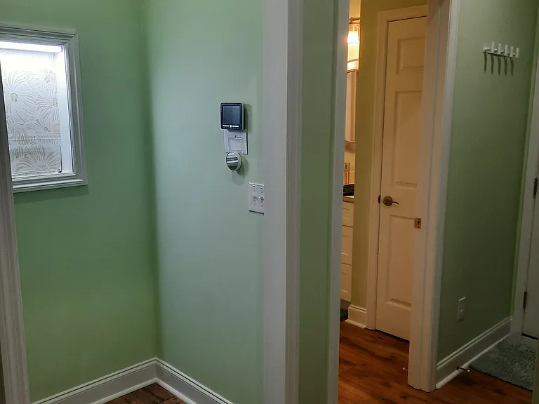 Hall leading to Master Bath and entrance to bathroom.