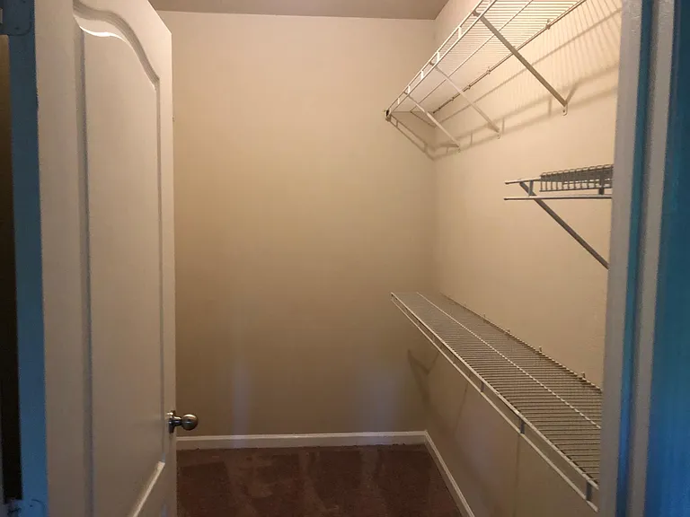Walk in closet at Mirabella