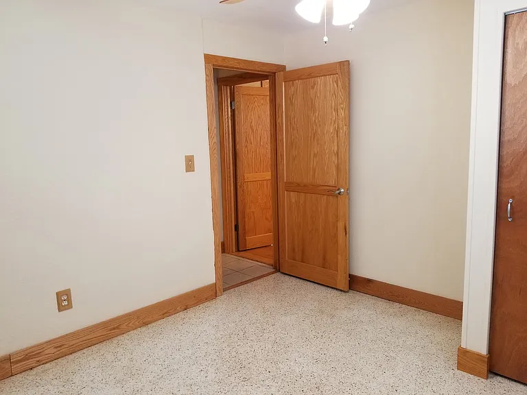Inside the second bedroom facing the bedroom door, closet on the RT
