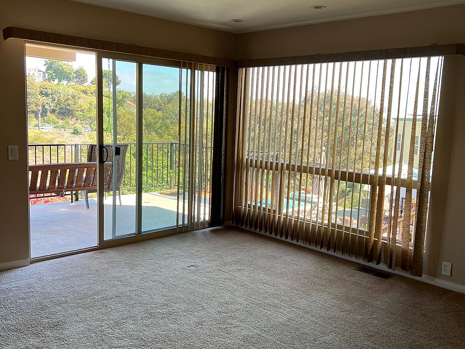 Living room looking to deck and trees.