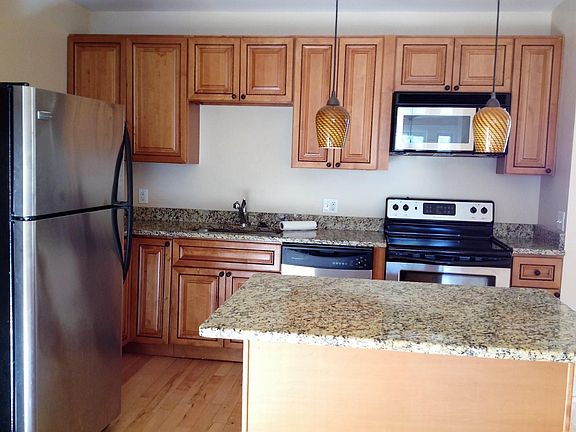 Kitchen area of open living/dining/kitchen floor plan.