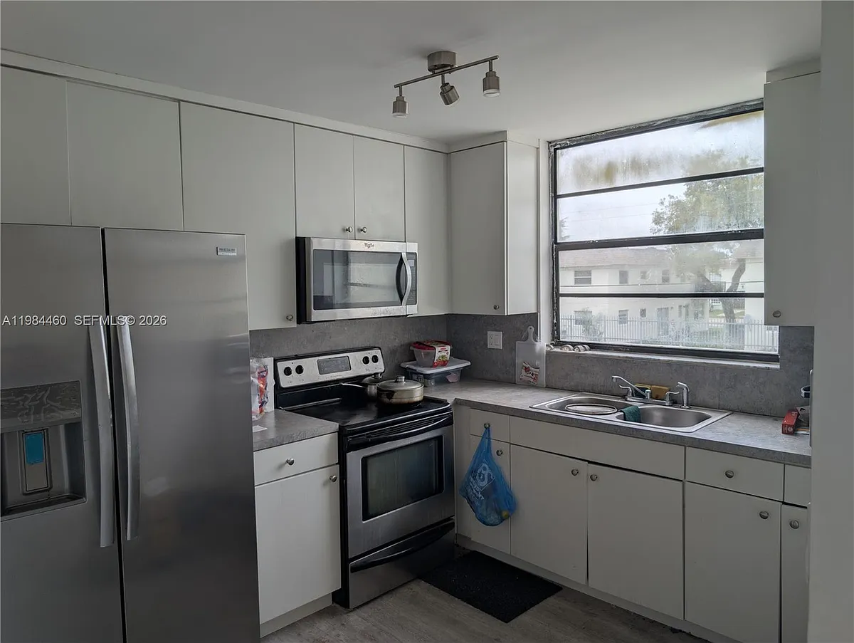 Building Photo - 1788 NW 55th Ave #203