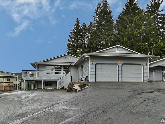 Beautiful wrap around deck and plenty of parking on the property.