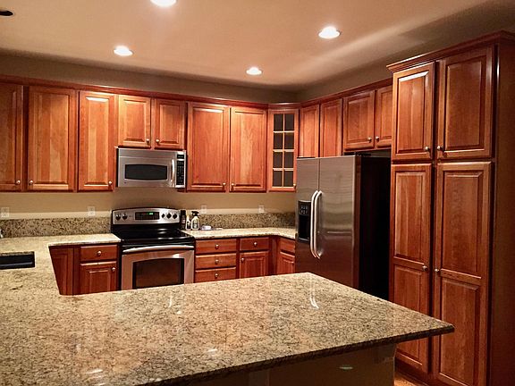 Kitchen with granite countertops.