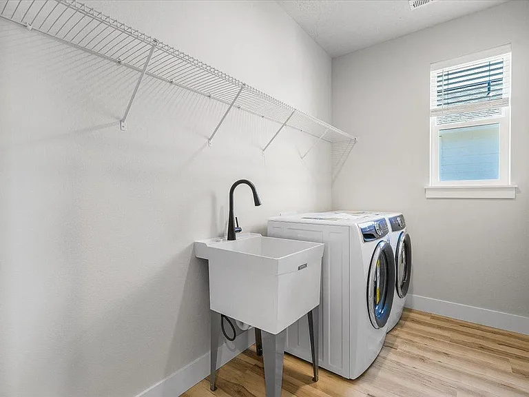 Laundry room with utility sink - Imperial floorplan