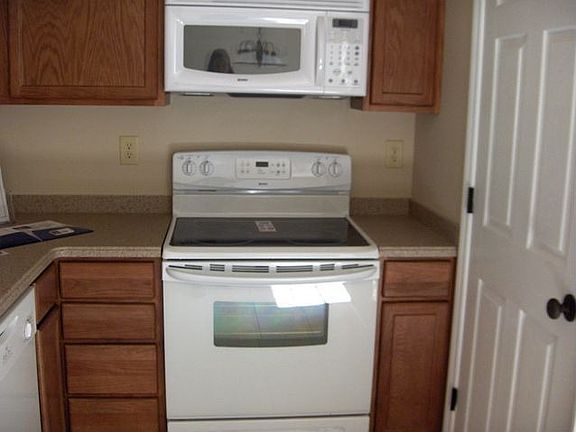 Kitchen has smooth top stop, microwave, dishwasher 