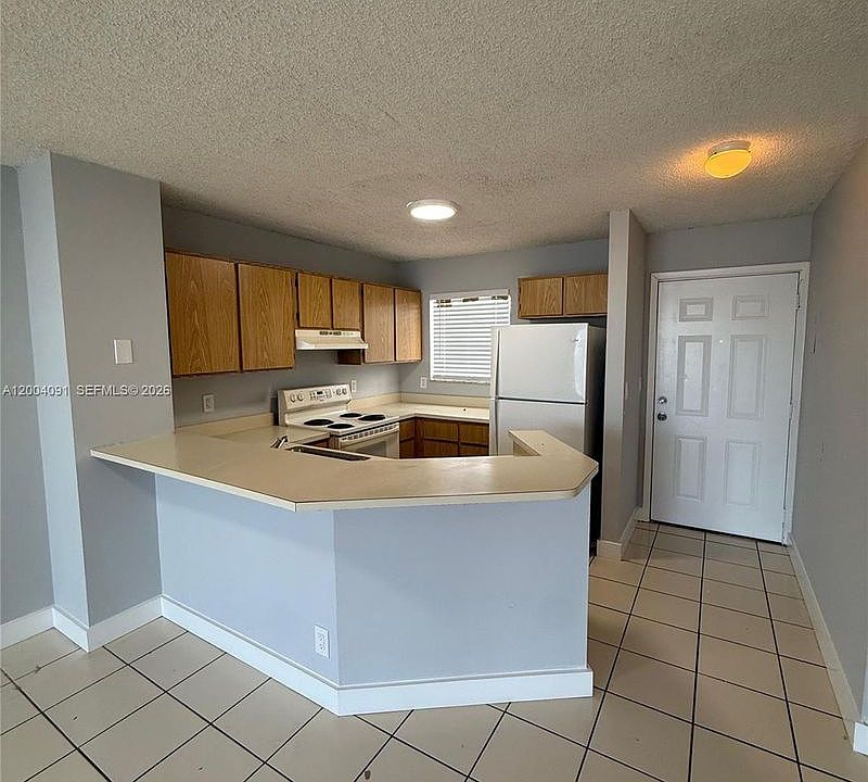 1st image of 8710 N Sherman Cir APT 305