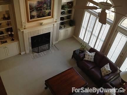 Fabulous Family Room with Gas Fireplace
						:
						2-Story Overlook, Fireplace - Marble, Palladium Windows, Bookcases, French doors