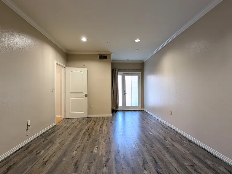 Primary Bedroom with private balcony