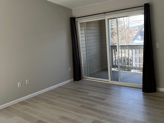 Spacious living room with a balcony
