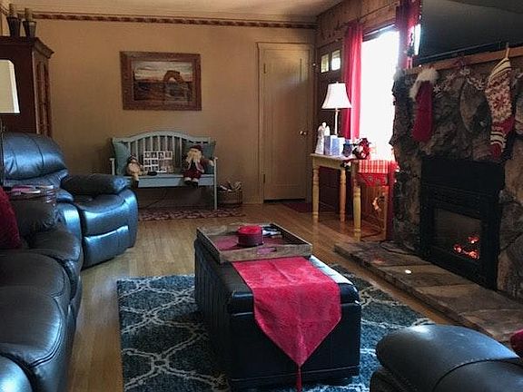 The living room is spacious and has a great view.