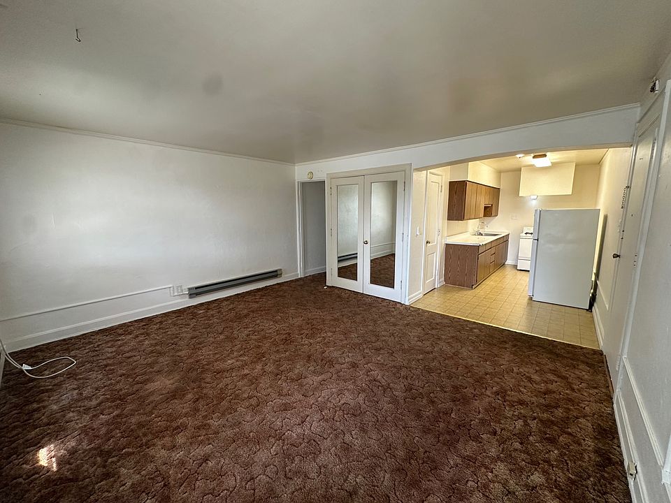 Living area and kitchen from south windowns